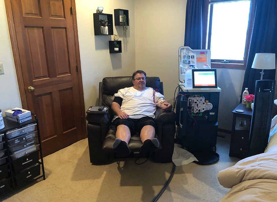 patient-embraces-home-hemodialysis Home hemodialysis patient Tim receiving treatment with the Tablo® Hemodialysis System